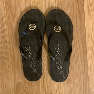Michael Kors flip flops.
